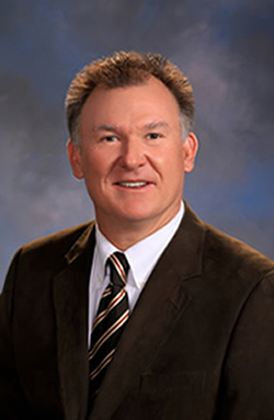 Dr John B Staub